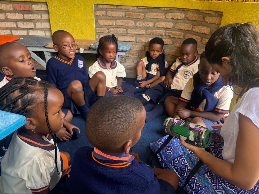 Young learners listening during group time.